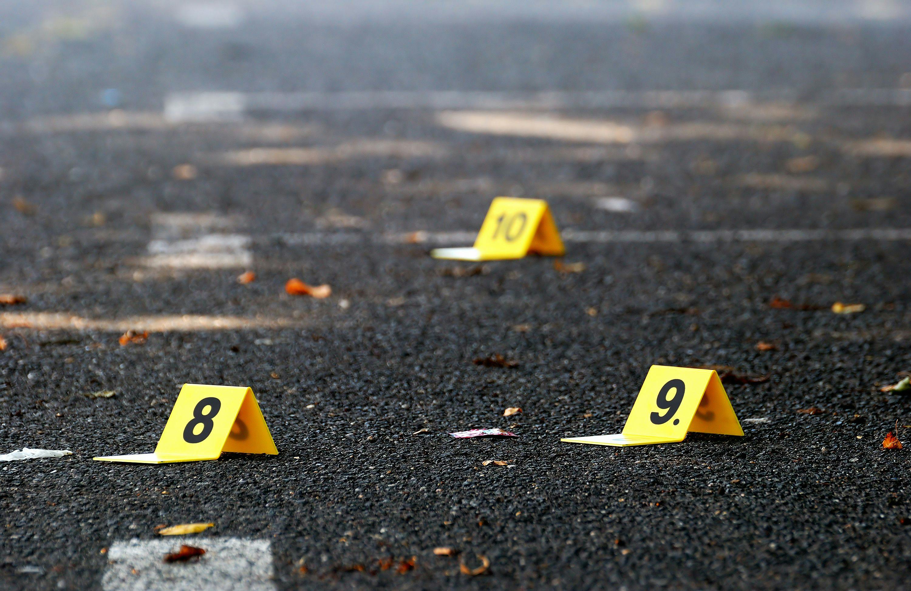 Crime Evidence Markers on Asphalt | Image Credit: © Forance - stock.adobe.com