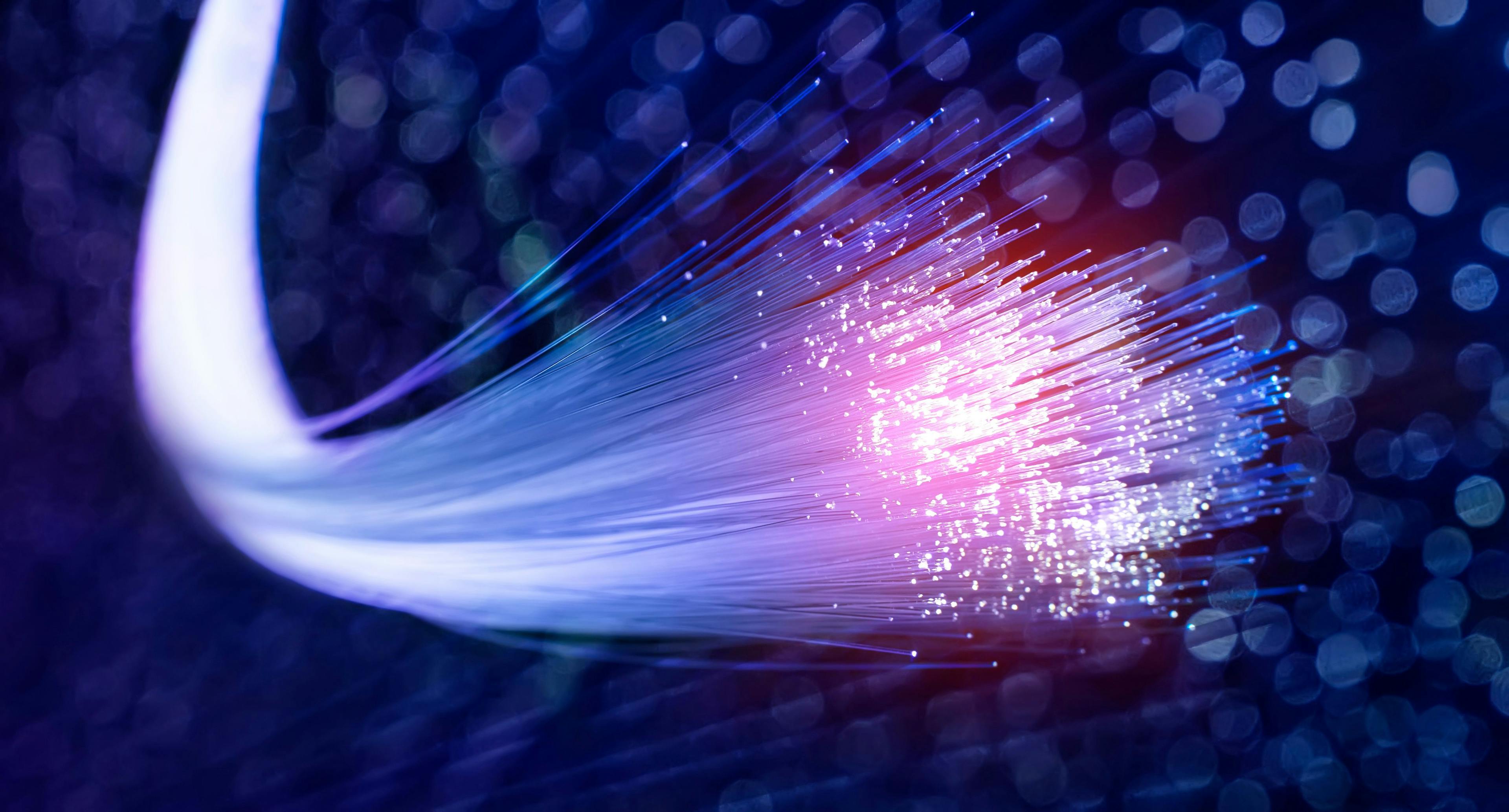 optical fibres dynamic flying from deep on technology background | Image Credit: © xiaoliangge - stock.adobe.com