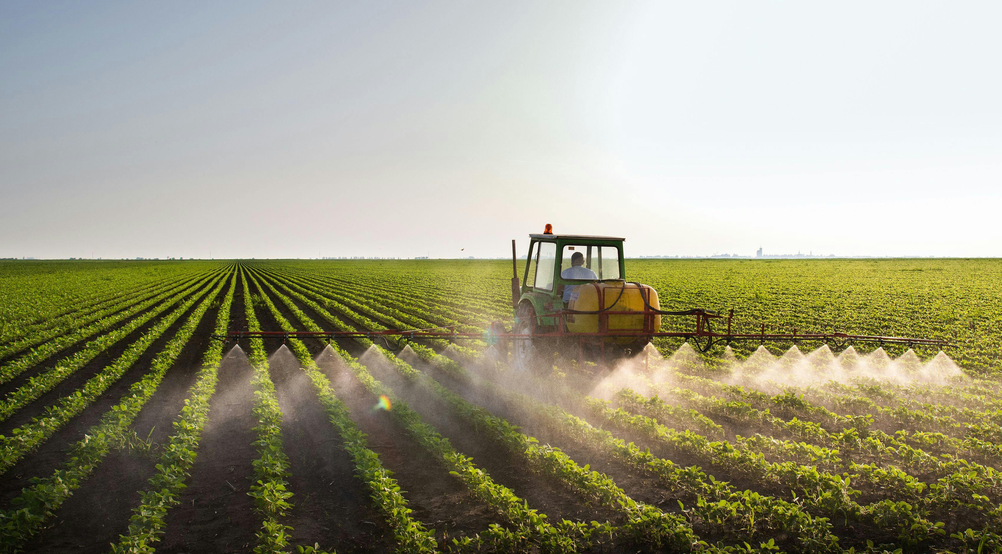 Tractor spraying soybean field | Image Credit: © Dusan Kostic - stock.adobe.com.