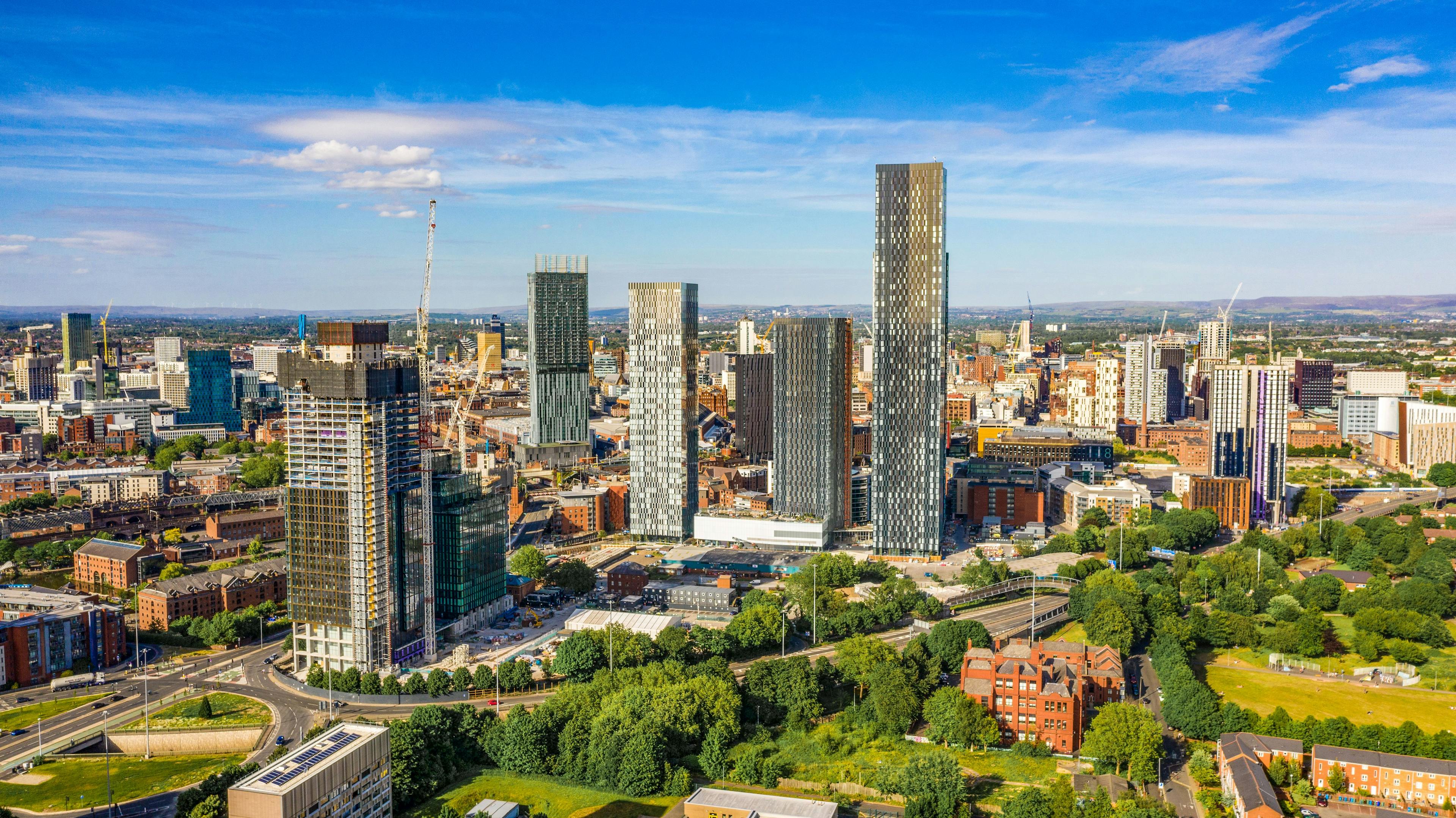 Aerial shot of Manchester UK on a beautiful summer day during pandemic lock-down | Image Credit: © zaeball - stock.adobe.com