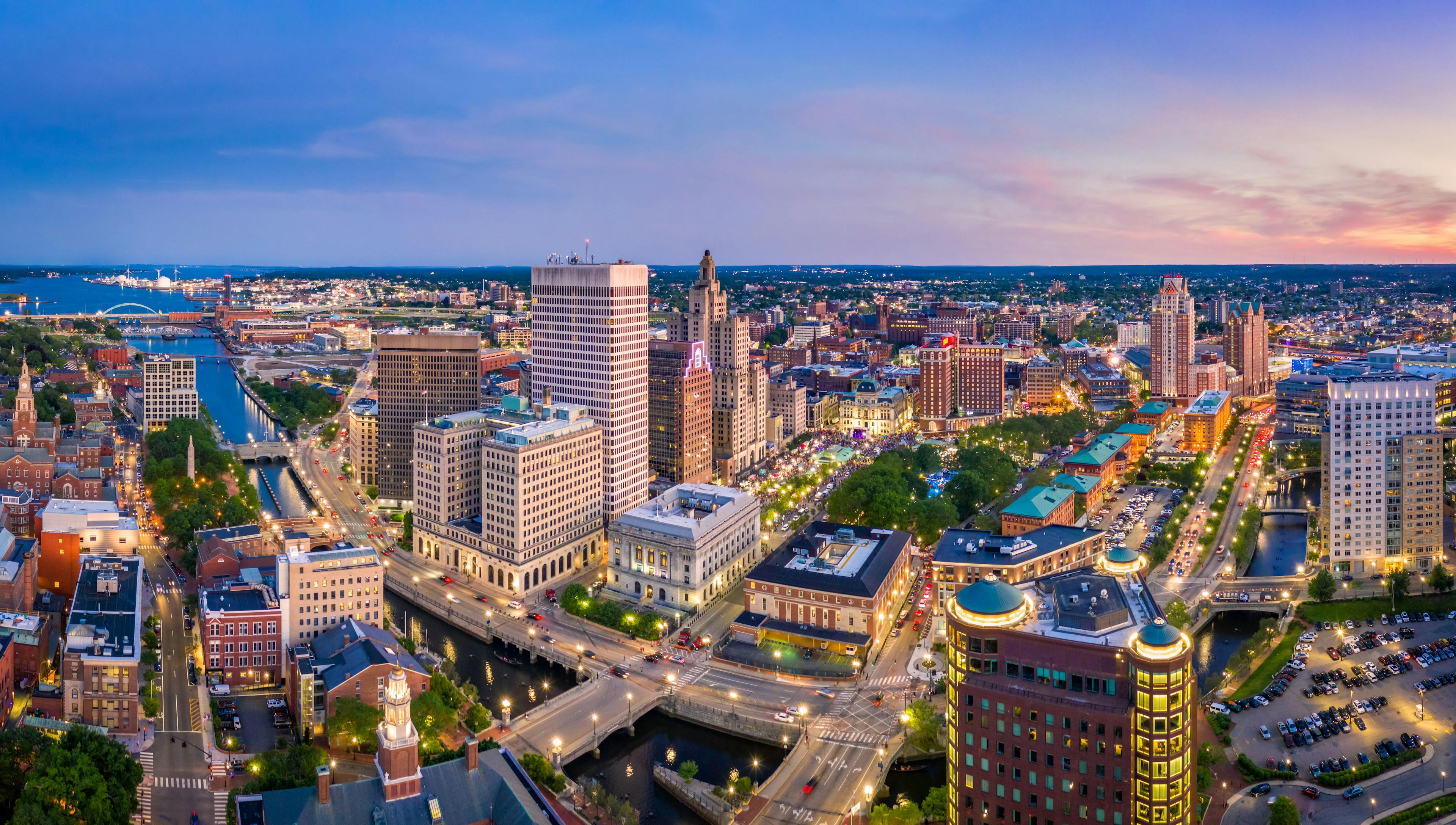 Aerial panorama of Providence skyline at dusk. Providence is the capital city of the U.S. state of Rhode Island. Founded in 1636 is one of the oldest cities in USA. | Image Credit: © mandritoiu - stock.adobe.com