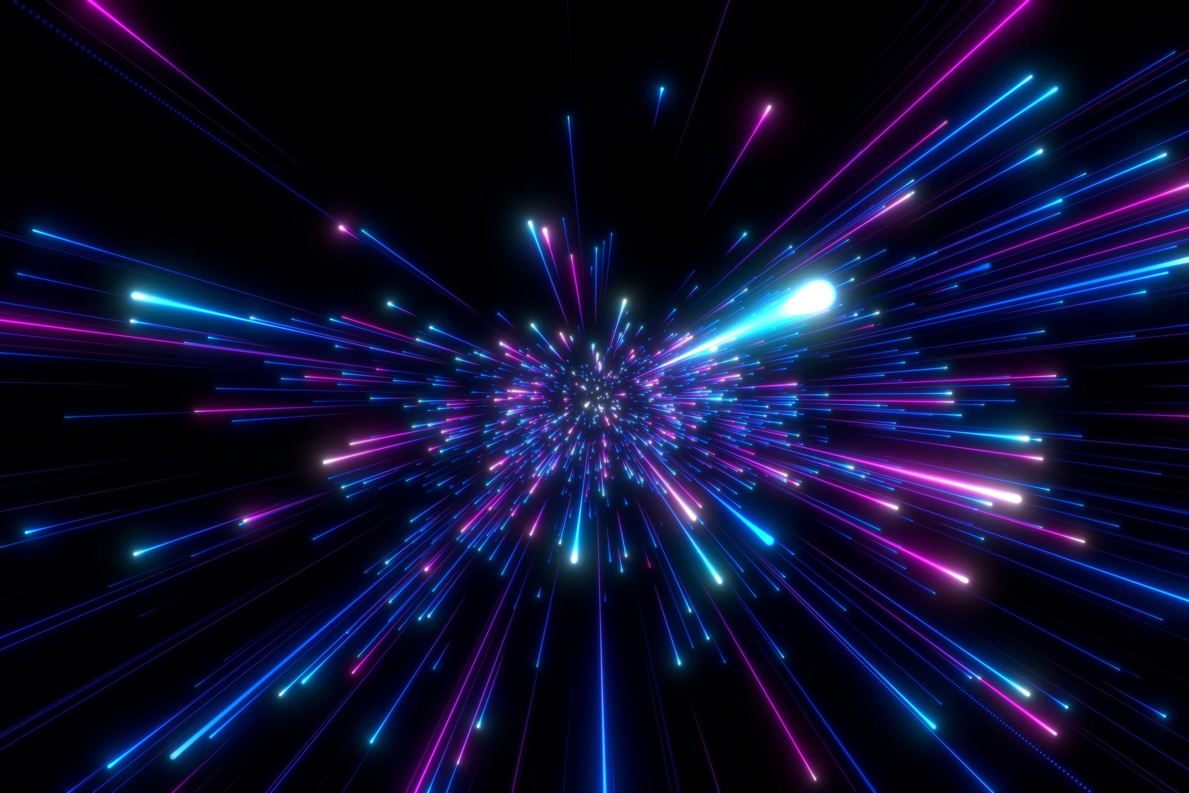 atomic emission (purple, blue, and pink lights zooming across a black background
