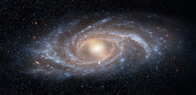View from space to a spiral galaxy and stars. Universe filled with stars, nebula and galaxy. Elements of this image furnished by NASA. Image Credit: © Tryfonov - stock.adobe.com