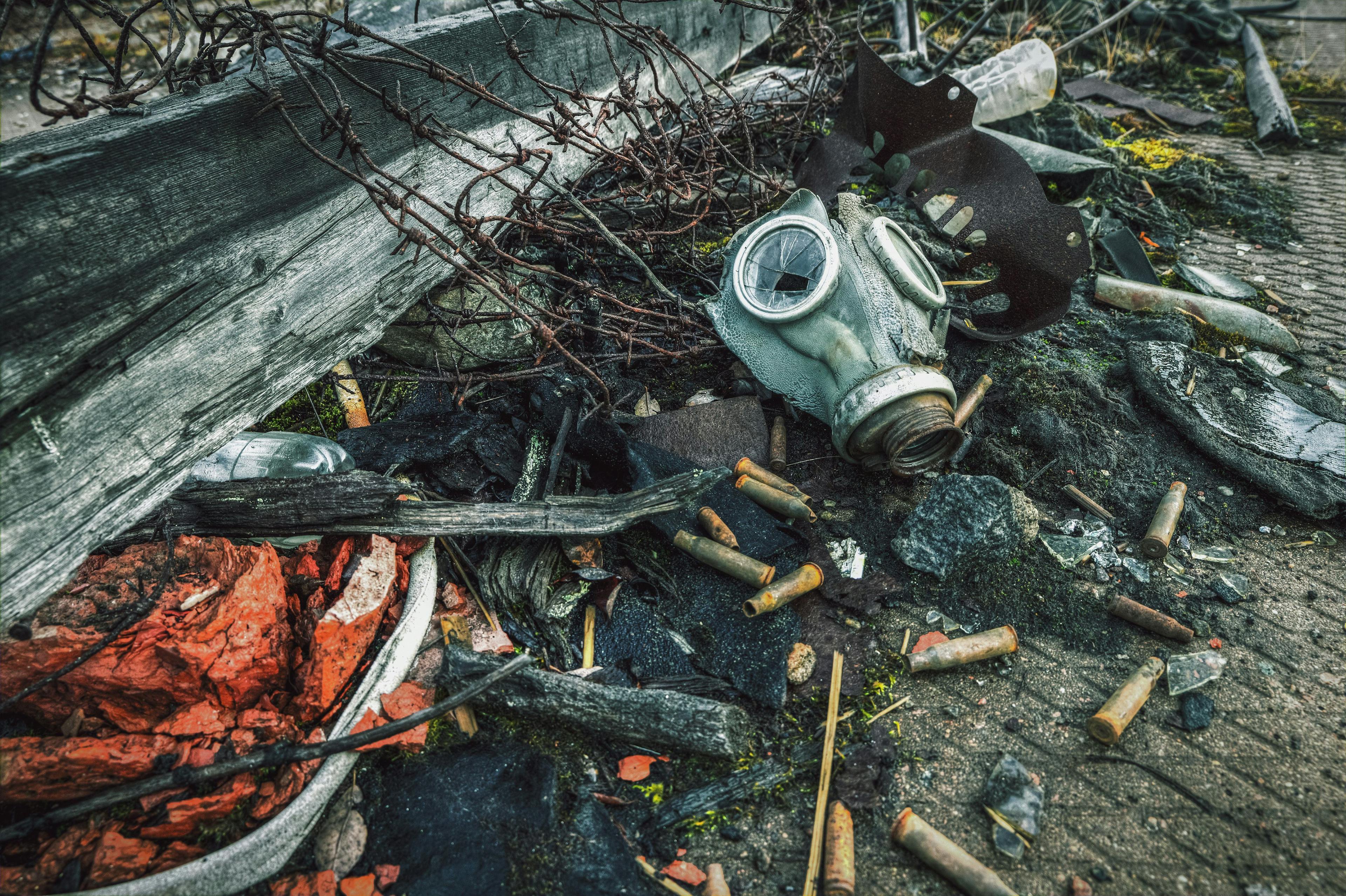 After a nuclear war. The old gas mask and ammunition among the ruins | Image Credit: © nouskrabs - stock.adobe.com