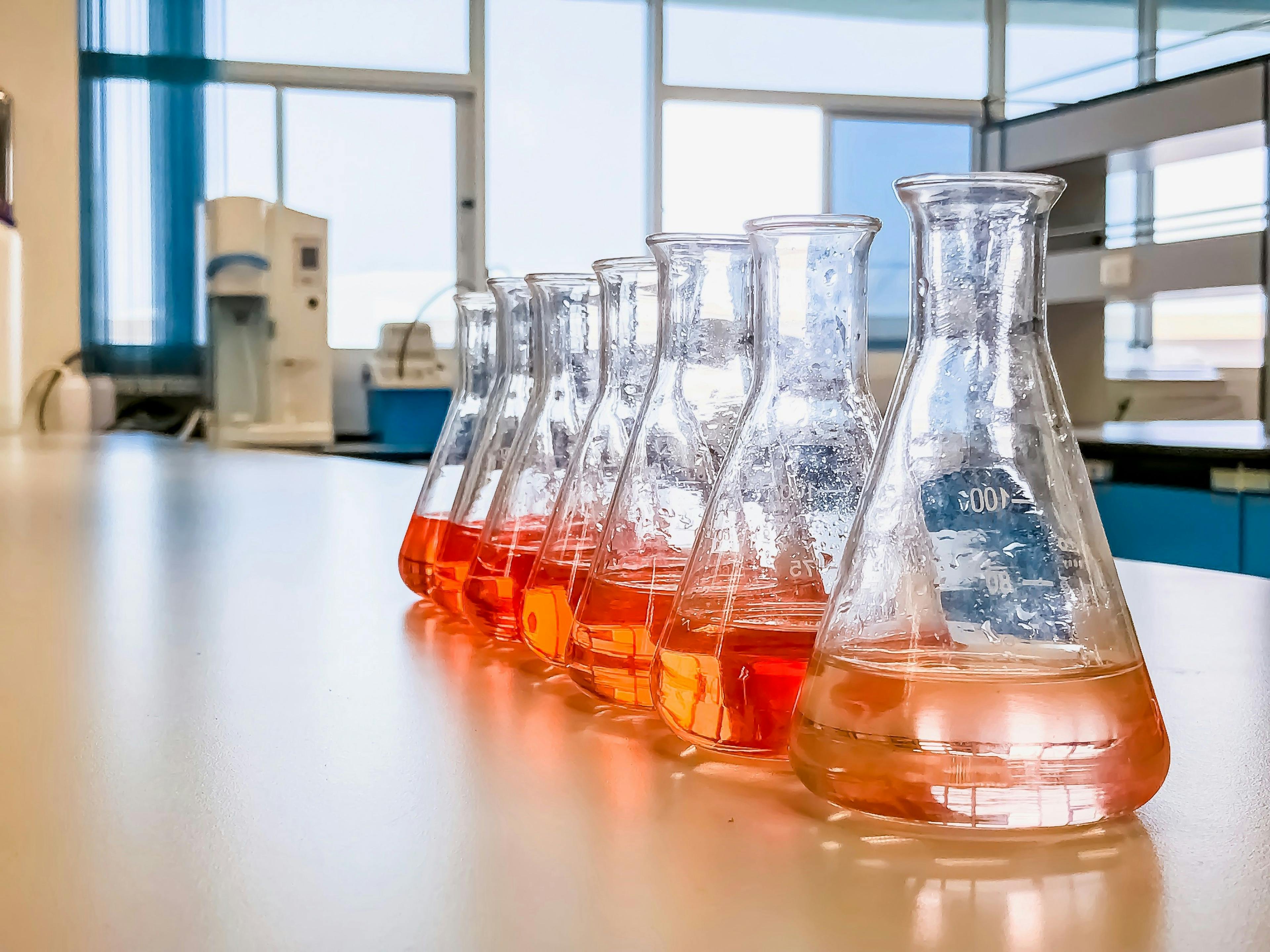 The Erlenmeyer flask in the line with color range solvent using for analysis calibration curve of iron in waste water sample. The experiment in chemistry laboratory. | Image Credit: © Arpon - stock.adobe.com