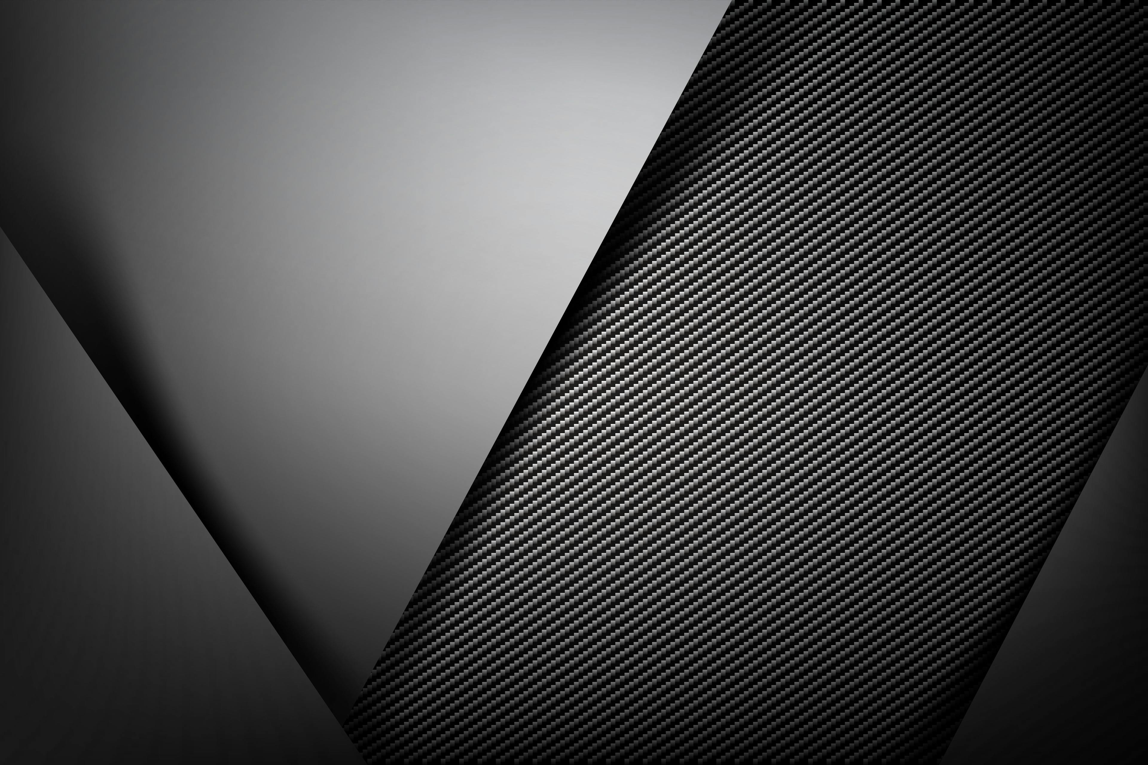 Abstract background dark with carbon fiber texture vector illust | Image Credit: © Kaikoro - stock.adobe.com