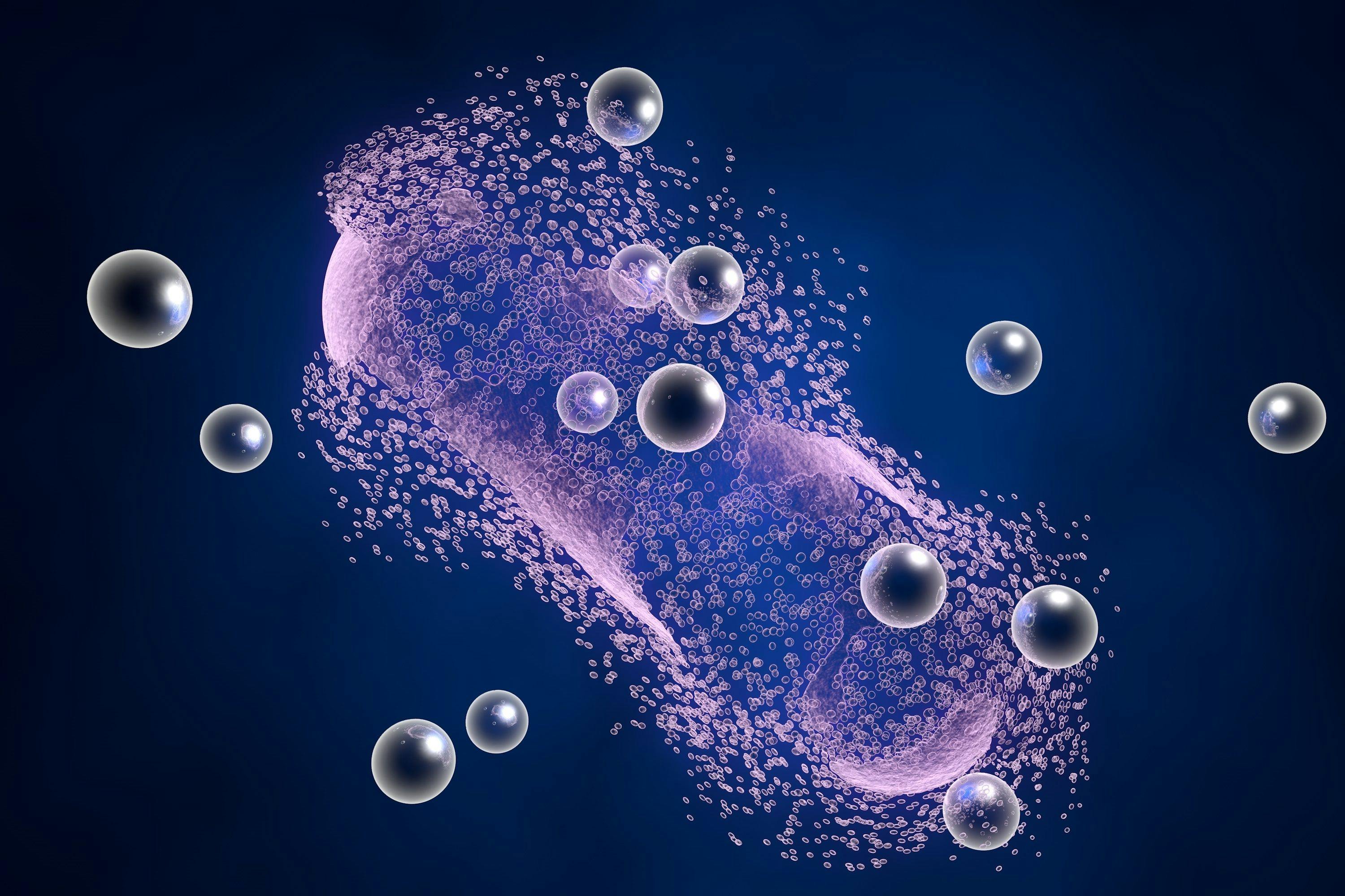 Destruction of a bacterium by silver nanoparticles. An illustration can be also used to demonstrate action of any antibiotic substance or drug | Image Credit: © Dr_Microbe - stock.adobe.com