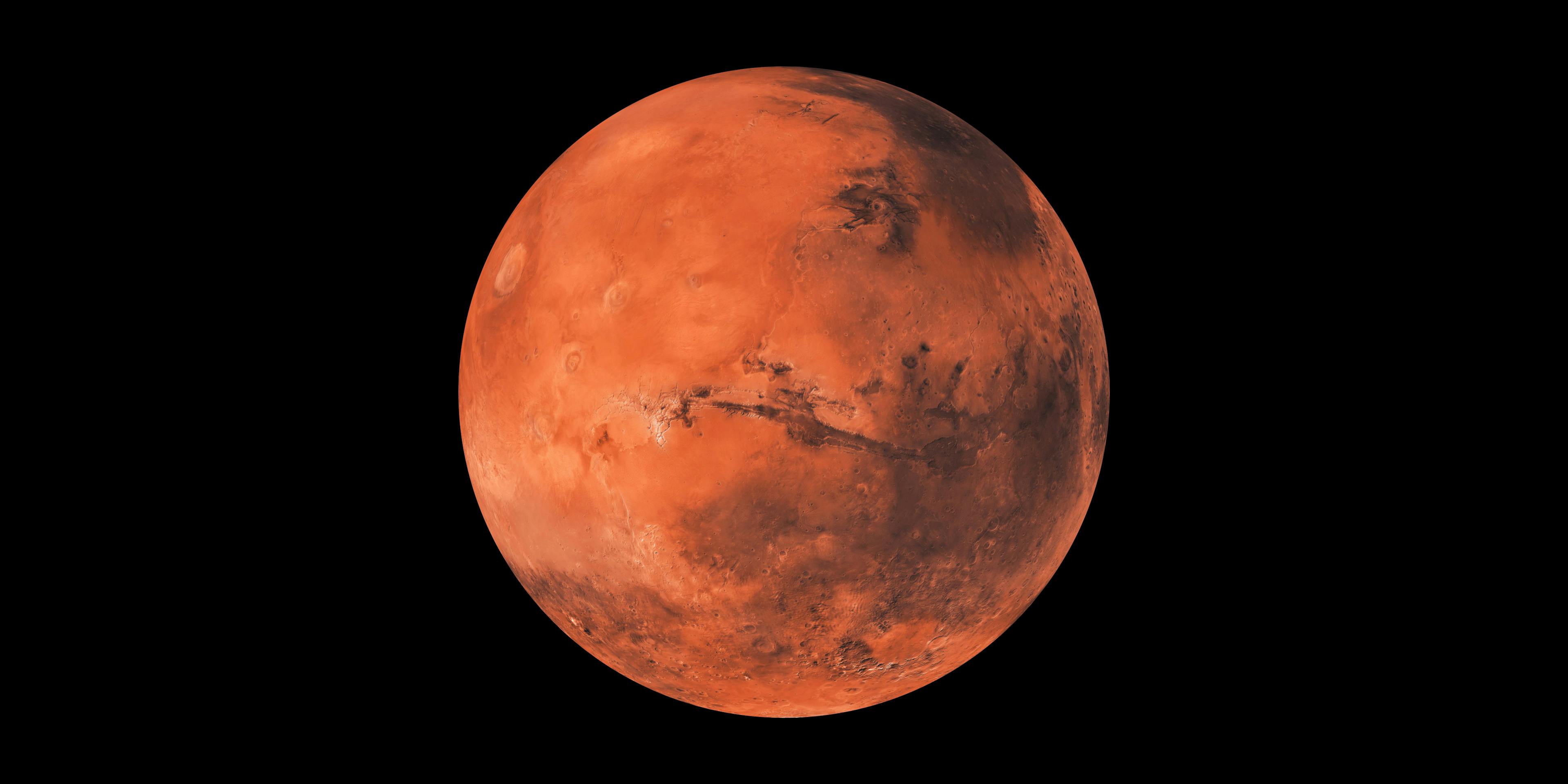 Mars red planet black background | Image Credit: © Martin - stock.adobe.com