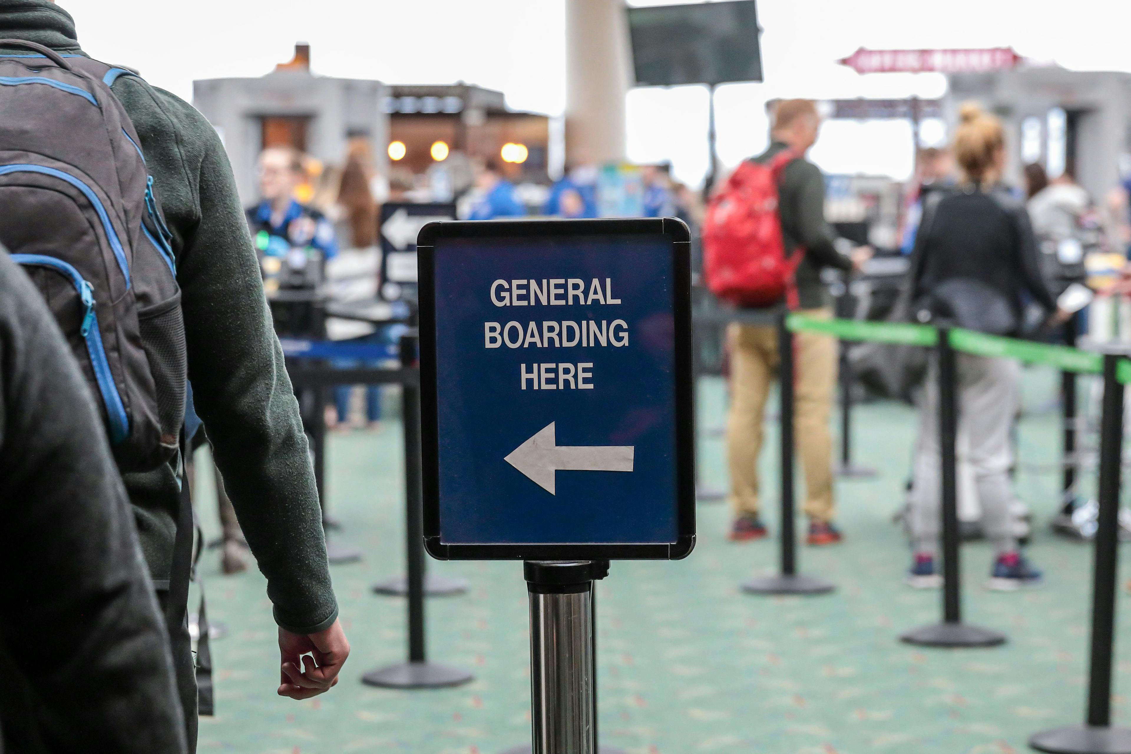 Posted sign in an airport read "General boarding here" to direct passenger for TSA security check | Image Credit: © Dmitry - stock.adobe.com