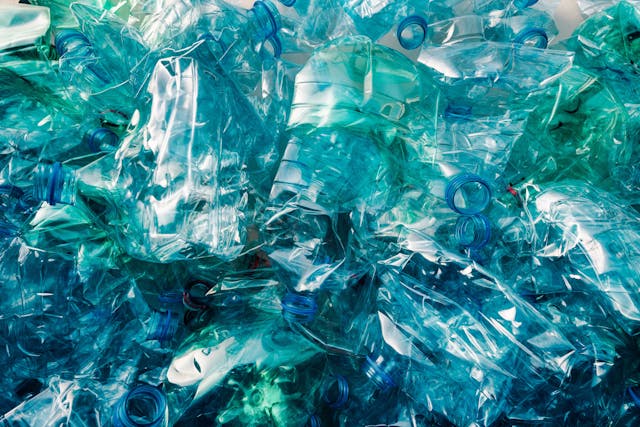 Crushed plastic bottles heap | Image Credit: © Bits and Splits - stock.adobe.com